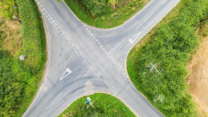 trump-captured-cftc-gaming-crossroads Overhead shot of a set of crossroads, a position the US gaming industry currently finds itself in