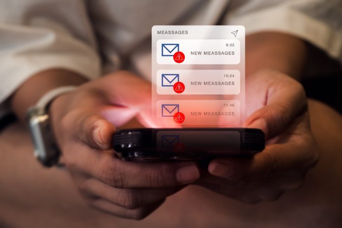 Australian-regulator-sanctions-Tabcorp-for-spamming-VIPs-(1) Text spam concept as The Australian Communications and Media Authority has penalised Tabcorp Holdings with a penalty in excess of AUS $4m for spamming VIP players.