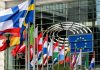 EU calls for digital well-being focus to combat teen gambling crisis The Eu flag alongside the flags of many countries across the continent