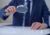 Swedish regulator undergoes compliance review of Svenska Spel Businessman with magnifying glass as AB Trotting and Galloping, Svenska Spel Sport & Casino AB and Lotto Direct Limited will be checked for compliance by the Swedish regulator