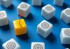 Marketing’s role in a fair and robust Latin American online betting industry An arrow hits and higlights a cube from several others, like proper marketing can do for betting companies.