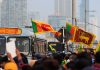 Sri Lanka set for major gambling reforms A crowd of people in Sri Lanka holding the country's flag