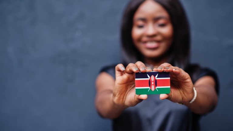 Woman holds Kenya flag