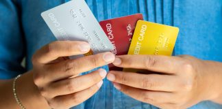 Swedish government plans expanded credit ban Man holds several credit cards, which they will no longer be used to gamble with in Sweden
