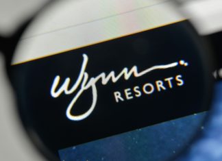 Wynn Resorts completes the acquisition of iconic London venue Wynn Resorts logo seen through a microscope