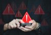Dutch regulator buoyant on deposit limit impacts, but trade bodies warn of a dangerous future Warning signs coming from a phone