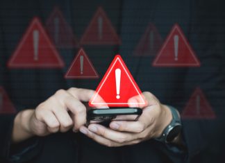 Dutch regulator buoyant on deposit limit impacts, but trade bodies warn of a dangerous future Warning signs coming from a phone