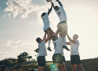 Gamzix secures aggregation uplift with SoftGamings People being lifted in a rugby lineout