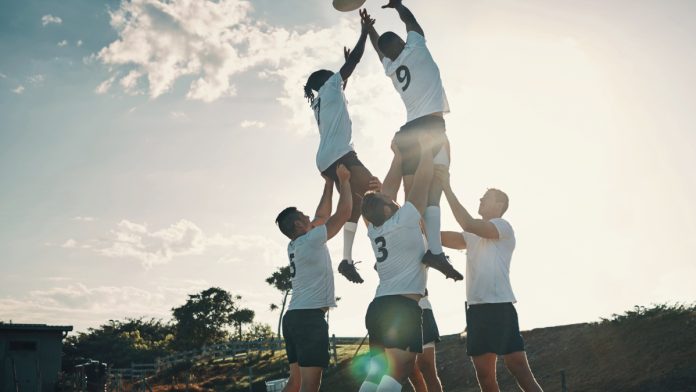 gamzix-aggregation-uplift-softgamings-(1) People being lifted in a rugby lineout