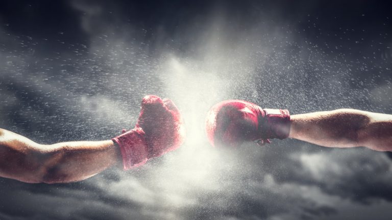 GGL’s new chair to continue black market fight Two boxing gloves come together, indicating a fight