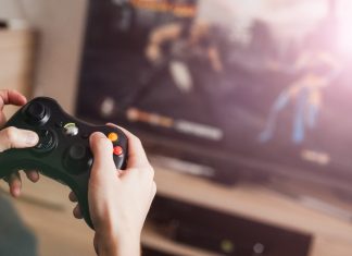 Hollywood Bets reprimanded for EA Sports FC affiliate ad targeting Close up of a video game controller