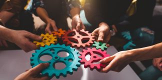 iGP strengthens iGaming Deck with BGaming integration Cogs being placed together