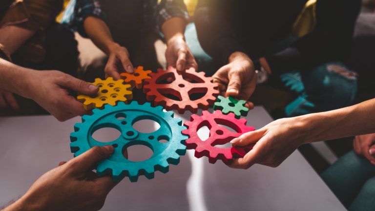 iGP strengthens iGaming Deck with BGaming integration Cogs being placed together