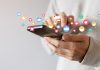 KSA issues first influencer penalty for illegal promotions Emojis fly out of a mans phone