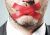 Silence ‘speaks volumes’ as optimism increases in the Philippines Businessman's mouth is taped over to prevent him speaking