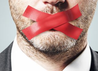 Silence ‘speaks volumes’ as optimism increases in the Philippines Businessman's mouth is taped over to prevent him speaking