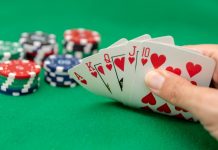 Playtech to lead FanDuel US poker evolution A poker hand showing a royal flush and poker chips