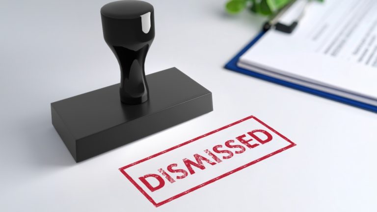 The word dismissed stamped on a piece of paper