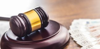 UKGC fines ProgressPlay £1m over ‘unacceptable’ AML failures Gavel with British pound currency
