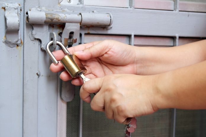 Padlock being unlocked