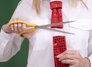 Philippine restrictions intensify as e-wallets ordered to cut iGaming ties Man cuts a tie