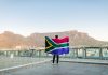Scathing remarks cause uncertainty for South Africa’s gambling operators A man stands in front of tabletop mountain stood in front of tabletop mountain