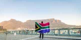 Scathing remarks cause uncertainty for South Africa’s gambling operators A man stands in front of tabletop mountain stood in front of tabletop mountain