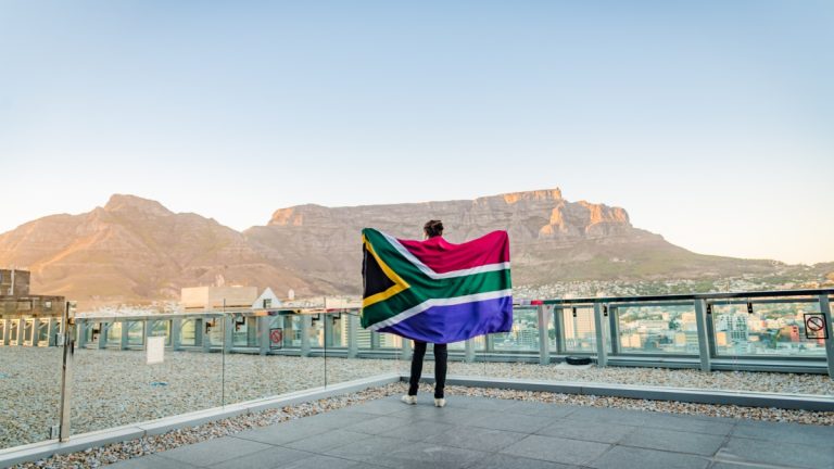 Scathing remarks cause uncertainty for South Africa’s gambling operators A man stands in front of tabletop mountain stood in front of tabletop mountain