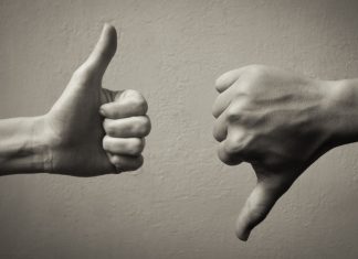 Star Entertainment’s lender rift intensifies future uncertainty One thumb up and one thumb down, showing a disagreement