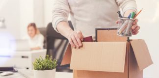 Major job cuts follow India’s online gaming ban man packing up cardboard box
