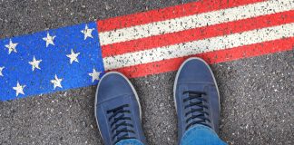 Merkur completes Gaming Arts acquisition to finalise US re-entry Person steps on US flag