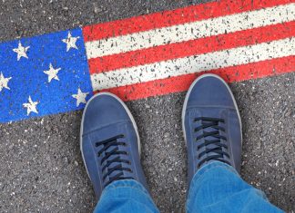 Merkur completes Gaming Arts acquisition to finalise US re-entry Person steps on US flag