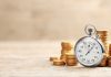 Pragmatic Play evolves live casino focus with Money Time Stacks of coins behind a stopwatch