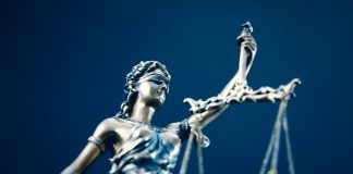 Evolution calls for justice in Playtech US defamation litigation case Lady Justice