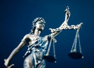 Evolution calls for justice in Playtech US defamation litigation case Lady Justice