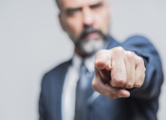 Evolution says Playtech commissioned defamatory smear campaign Angry man