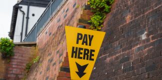 Dutch regulator elevates enforcement strategy after YouTuber fails to comply Pay here sign