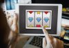 UK operators hit GGY highs despite new online slots limits Online slots