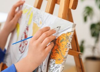 Digiplus losses paint a daunting picture for Philippines iGaming Close up of an artist painting a picture
