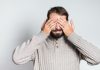 Labour MP says “nobody wants to see” gambling ads Man covers his eyes