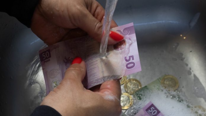 mexico-cartel-sanction-casino-laundering Washing money, signifying money laundering