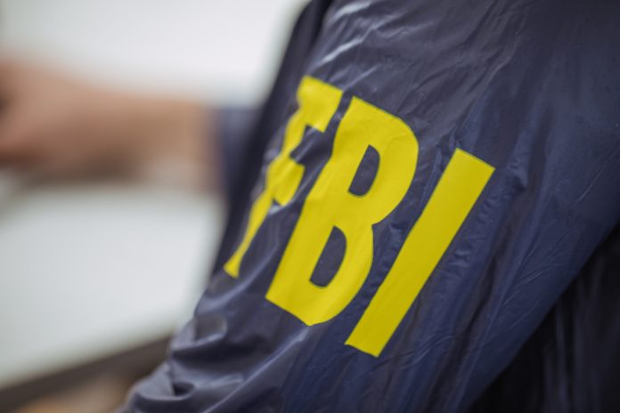 FBI warning Close up of FBI badge