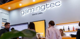 How Gamingtec built momentum across regulated markets in 2025 A picture of a Gamingtec stand at an industry event.
