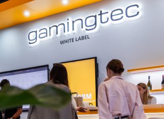 How Gamingtec built momentum across regulated markets in 2025 A picture of a Gamingtec stand at an industry event.