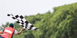 Hub88 gets the chequered flag with Solidicon integration Man waves chequered flag