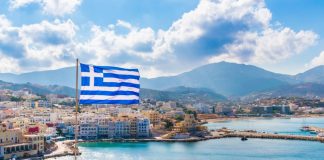 ELA Games takes next regulatory step with Greece approval Greece flag looks over a bay
