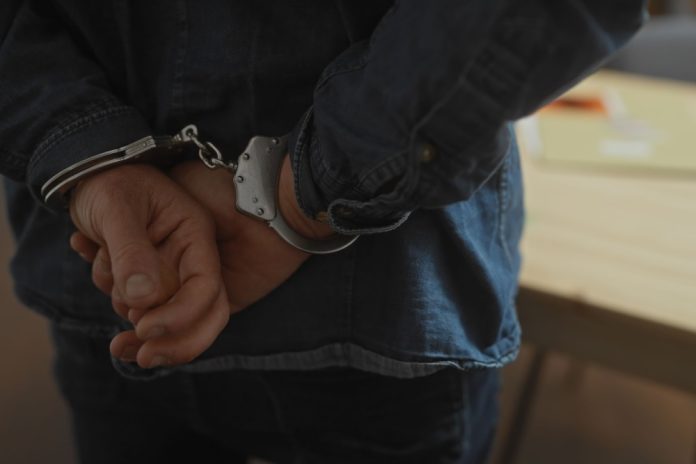 man in handcuffs
