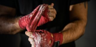 EveryMatrix deploys AI to join bonus abuse fight Hands being wrapped