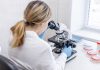 Spribe’s licence under the microscope in Sweden Woman looks through microscope