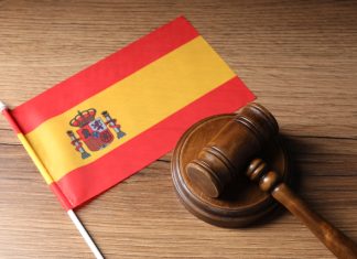 Spanish concern over inflated trends in female gambling Spain flag and gavel